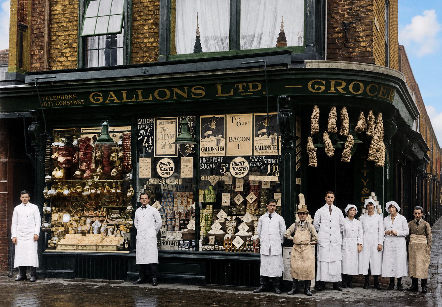 Staff standing outside a Gallons Ltd grocer’s shop, circa 1922